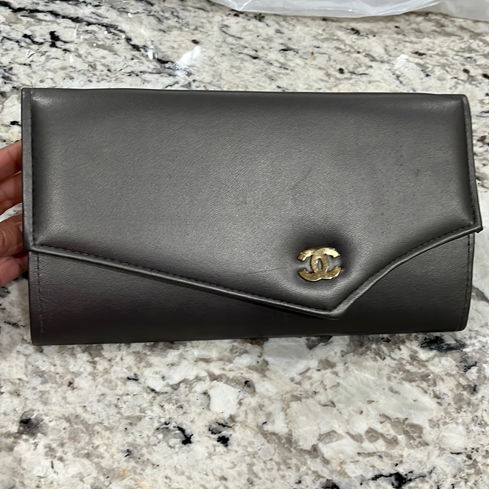 Fun silver clutch bag with Cs